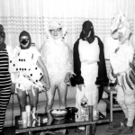 Five dressed as birds at a house party, Henry Grace and Michael L. Grace collection, ONE Archives at the USC Libraries
